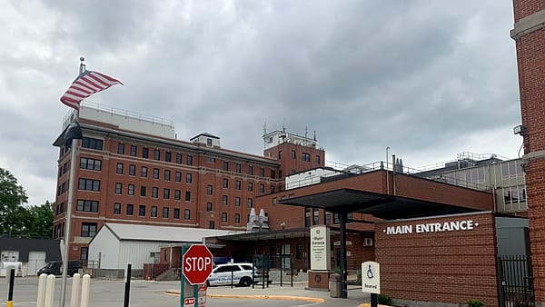 The main entrance of the Dwight D. Eisenhower VA Medical Center in Leavenworth, Kansas, under its portico