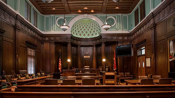 A courtroom at the United States Courthouse in Augusta, Georgia, with the bench, rail and public seating