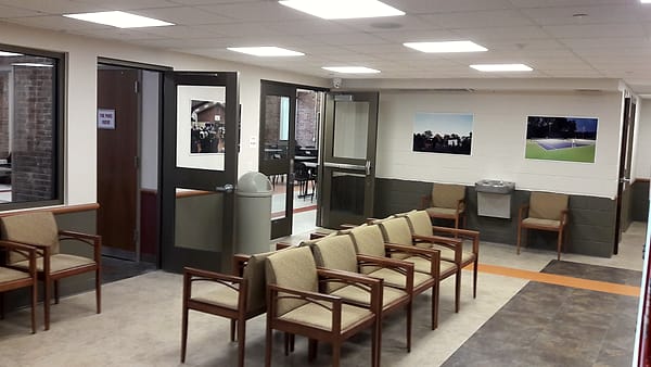 A lounge and waiting area inside the Summit Community Center in Summit, New Jersey, with soft seating