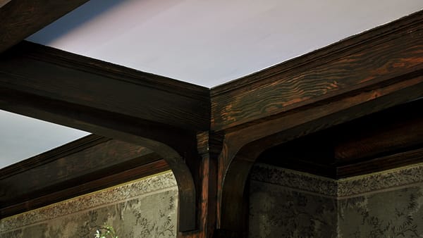 A detail of the living room at Lochkelden in Seattle, Washington, showing panelling and furnishings