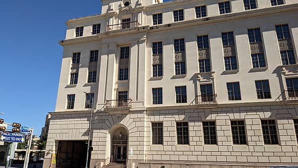 The stone facade of the United States Post Office and Courthouse on East Houston Street in San Antonio, Texas