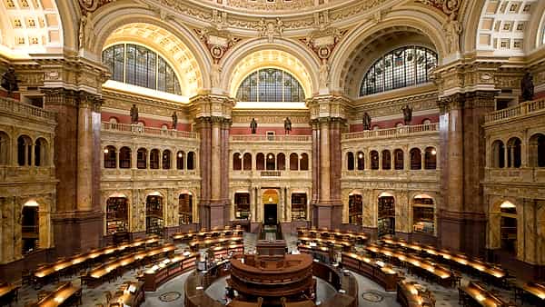 The Main Reading Room of the Library of Congress in the Thomas Jefferson Building, desks radiating beneath the dome