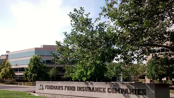 The offices of an insurance company in Novato, California, seen from the approach road across the lawn