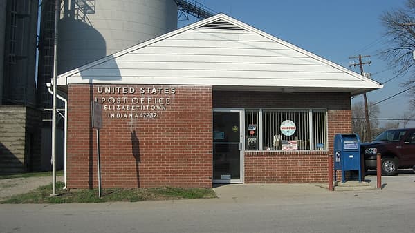 The front of the post office on Second Street in Elizabethtown, Indiana, seen from the road outside