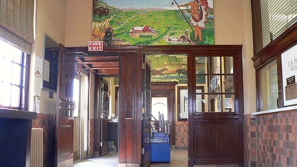 The public interior of the post office on North 9th Street in Rocky Ford, Colorado, looking toward the counter