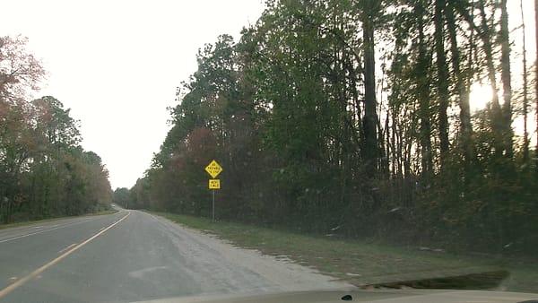 Southbound U.S. Route 301 in Baldwin, Florida, approaching a sign warning drivers to be prepared to stop