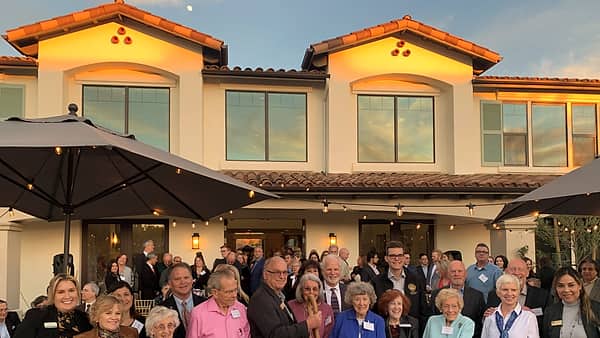 Residents and visitors gathered in the entrance of a senior living community at Camarillo, California