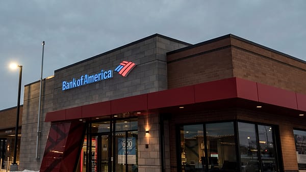 A bank branch in Eagan, Minnesota, its entrance and signage seen from the parking area in front