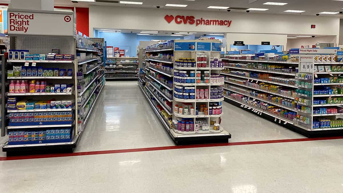 A pharmacy counter inside a large store at Dadeland in Miami, Florida, with the waiting area in front