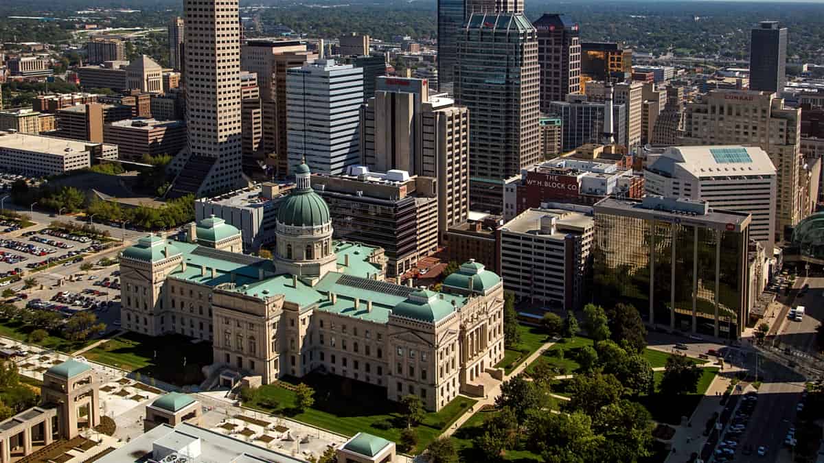 An aerial view east across downtown Indianapolis, Indiana, with the Indiana Statehouse in the foreground