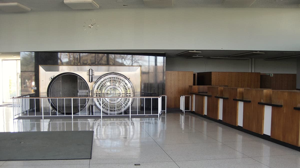 The interior of a bank vault in downtown Los Altos, California, its door standing open onto the deposit boxes